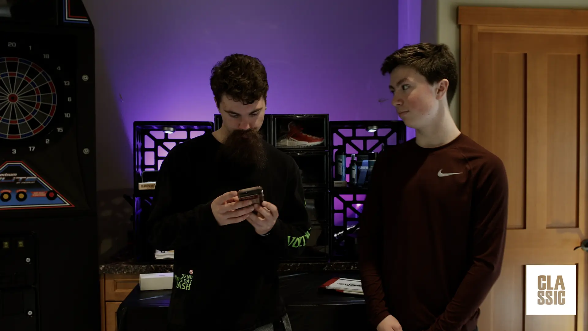 Still of Jake Larson and Kyle Larson in Justin McCoy Goes Sneaker Shopping with Classic.
